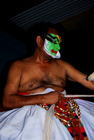 Kathakali performer during makeup