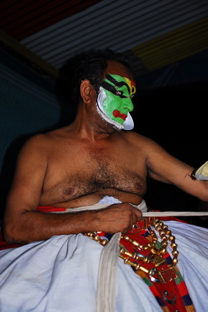 Kathakali performer during makeup