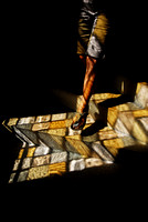 showing some leg in the stained glass refractions
